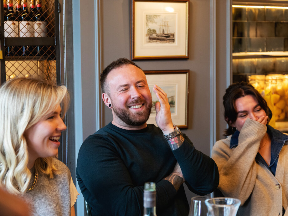 Fiasco Design turns 13! Image shows Fiasco team laughing.