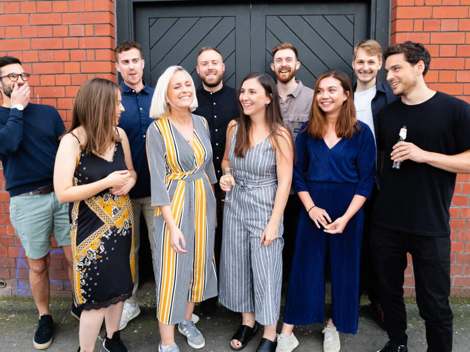 Fiasco Design turns 13! Photo shows Fiasco team standing outside Gather Round