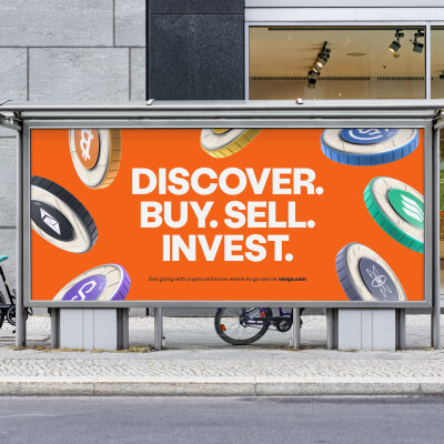 Venga billboard mock up. The billboard shows various crypto coins. Each coin type has a central circular colour - including orange, aqua, blue, purple and black - which is also repeated along its edge. The centre circle contains the coin's icon and shortened name in white. Each coin type has its own subtle textured brand pattern. The coins float in front of an orange background. The headline reads 'Discover. Buy. Sell. Invest' in white bold all caps. There is a small call to action line with a weblink to venga.com. The billboard is placed within a street scene, there is a concrete wall and shopfront behind it. Two bikes in partial view lean against it.