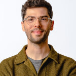 Image is a photograph of Chris Tozer